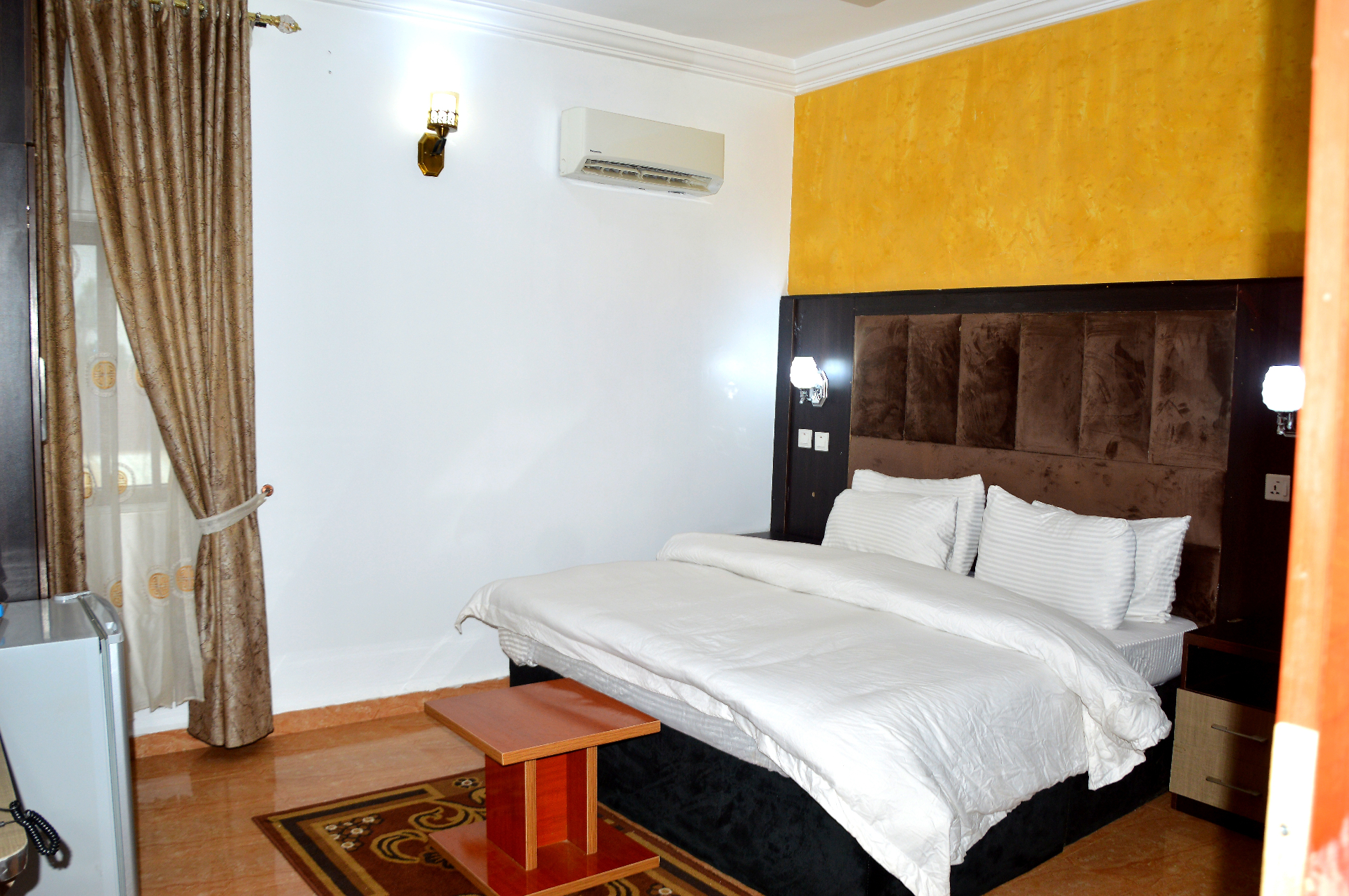 Suite bedroom with king bed